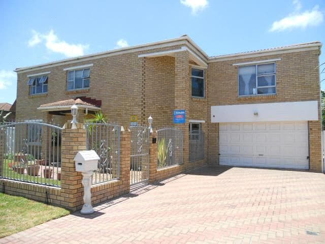Completed double-storey face-brick home by Honey Bee Construction